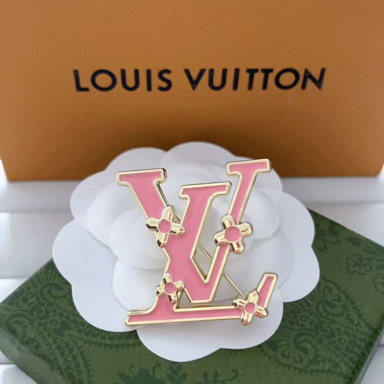 New LV brooch, with label.