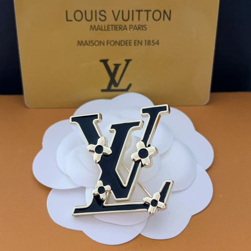 New LV brooch, with label.