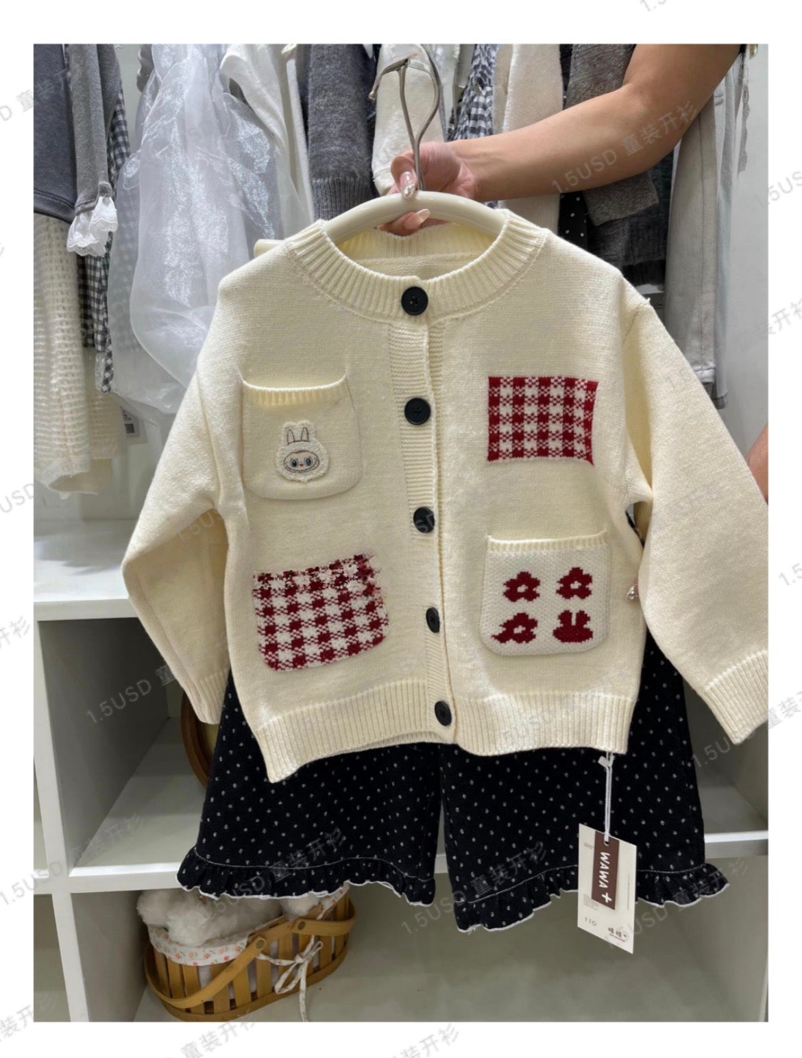 Girls cream knit cardigan with red plaid pockets and bunny patch