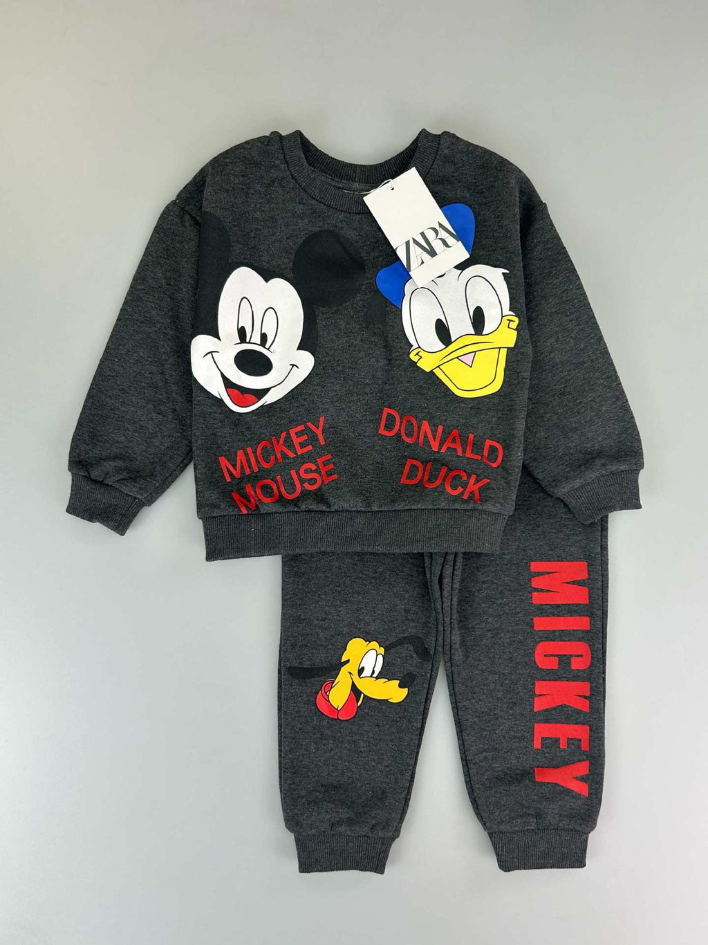 Mix-GC-110 | Kids' Minnie Mouse 2-Piece Tracksuit Set – Boys & Girls | Mixed Designs | Sizes 2-12 Years Old | $7.00/set | $84.00/dz | MOQ 500 | Total $3,500.00