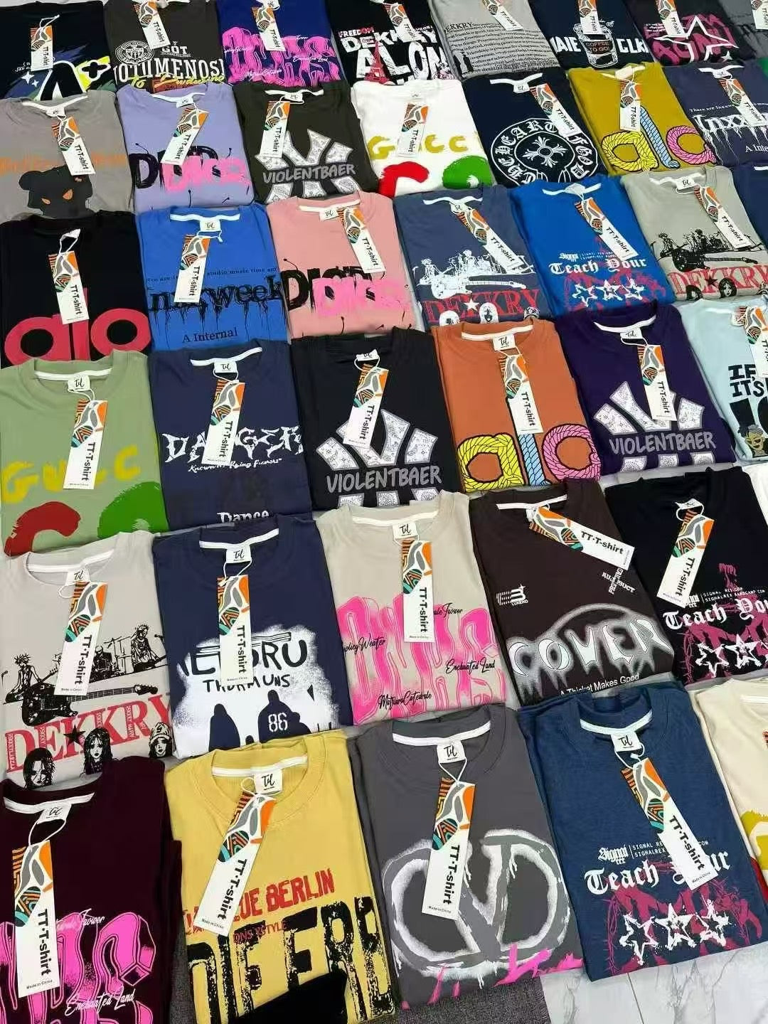 Mixed Graphic T-Shirts Wholesale Lot – $6.00/pc | MOQ 200 pcs | Free Shipping