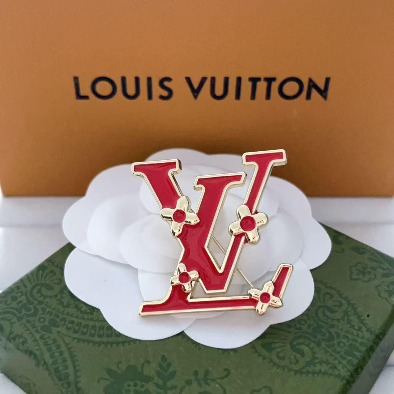 New LV brooch, with label.