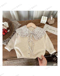 Girls beige knit cardigan with floral print collar and ribbon tie