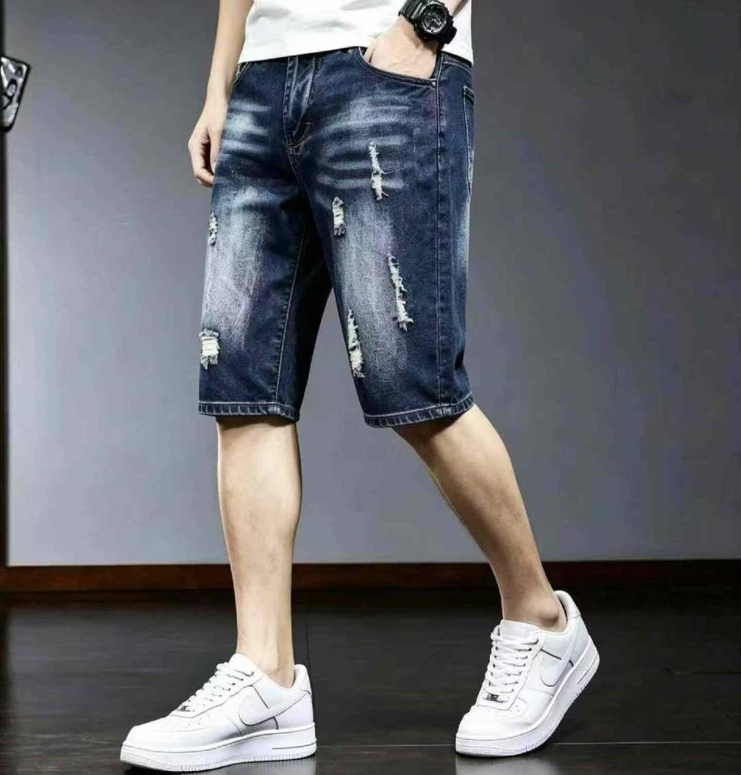 New summer style, high-elasticity men's retro washed cotton ripped denim shorts.