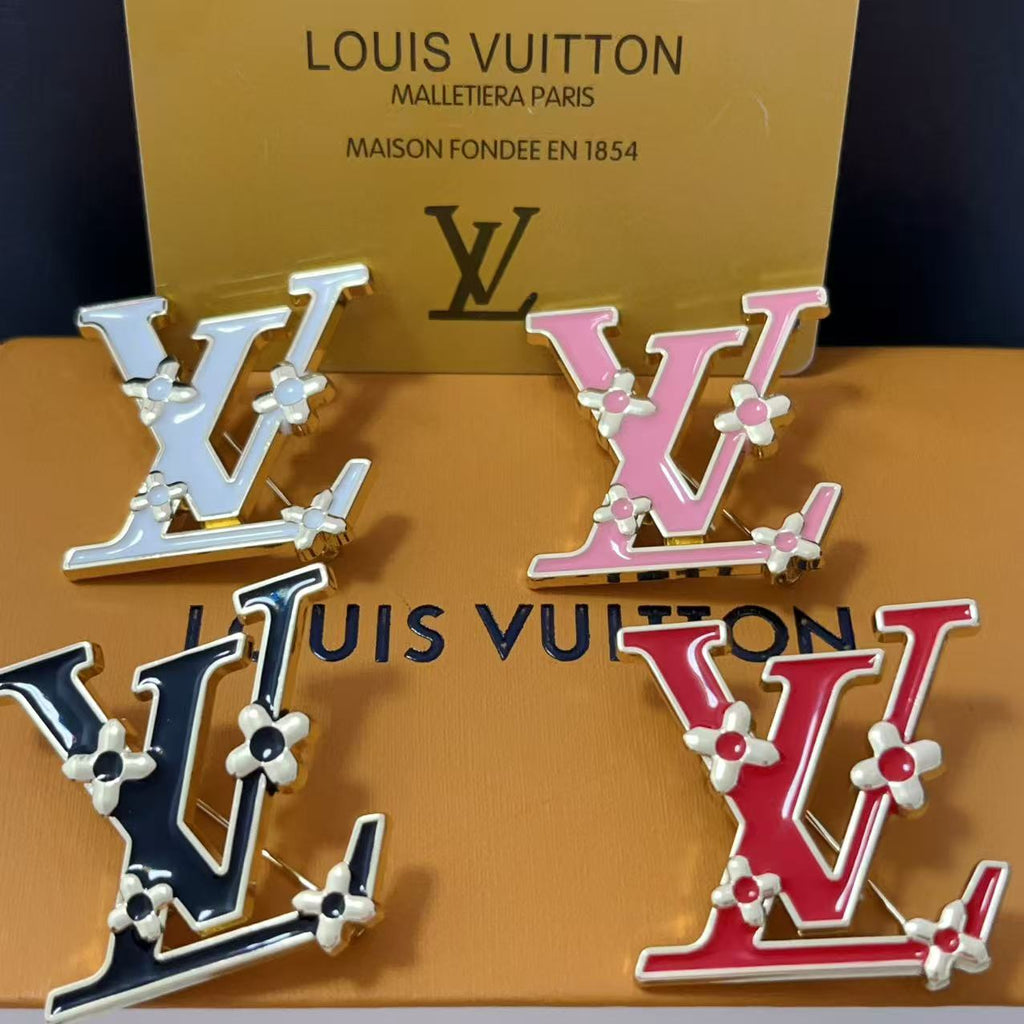 New LV brooch, with label.