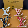 New LV brooch, with label.