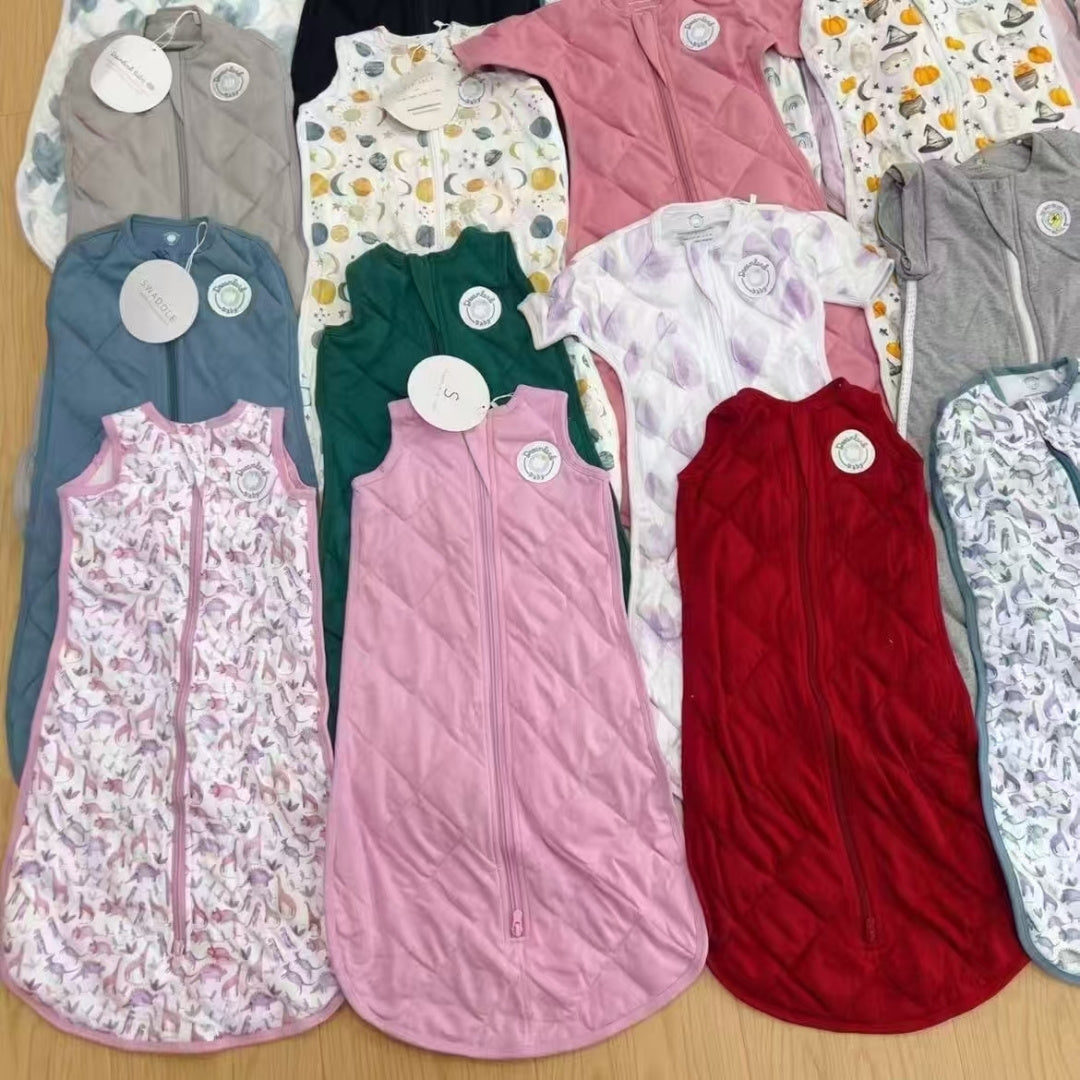 Dreamland baby sleep sack with granular filling. Made of organic cotton.