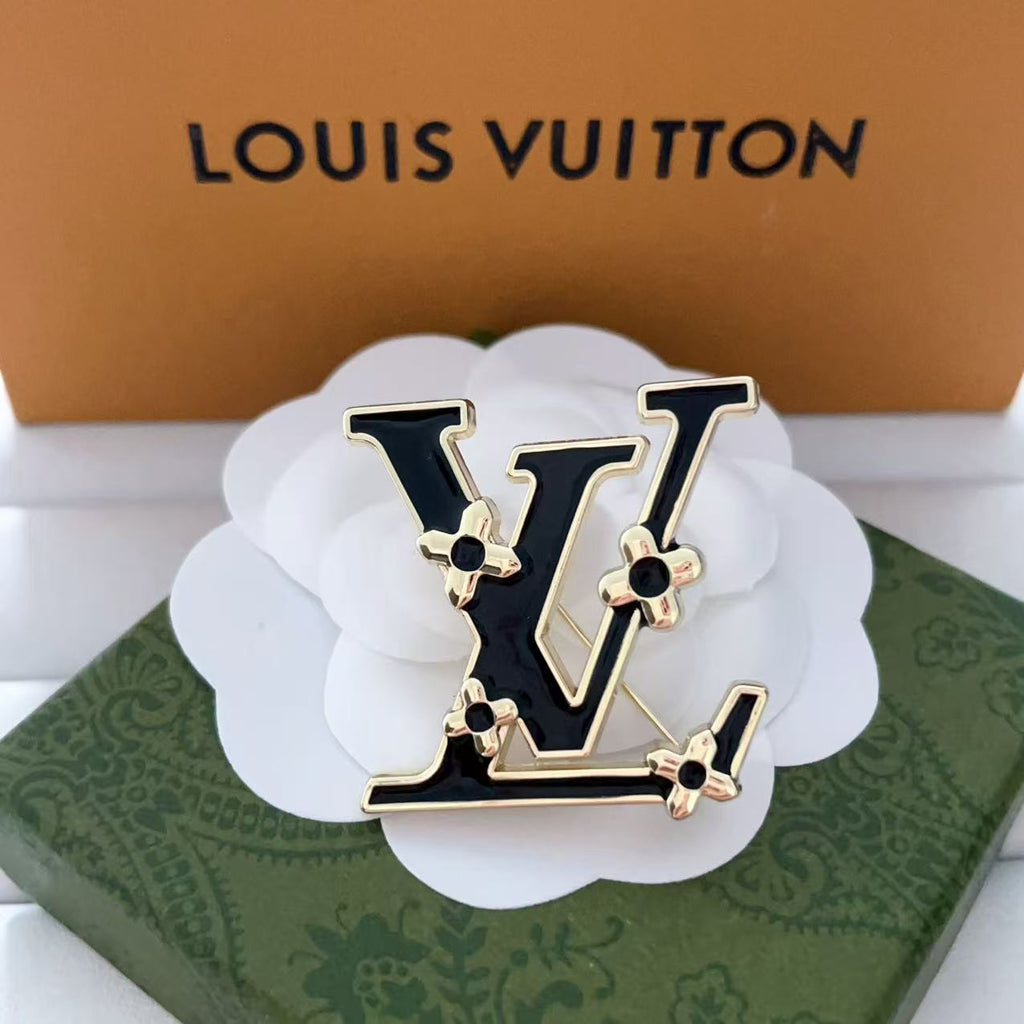 New LV brooch, with label.