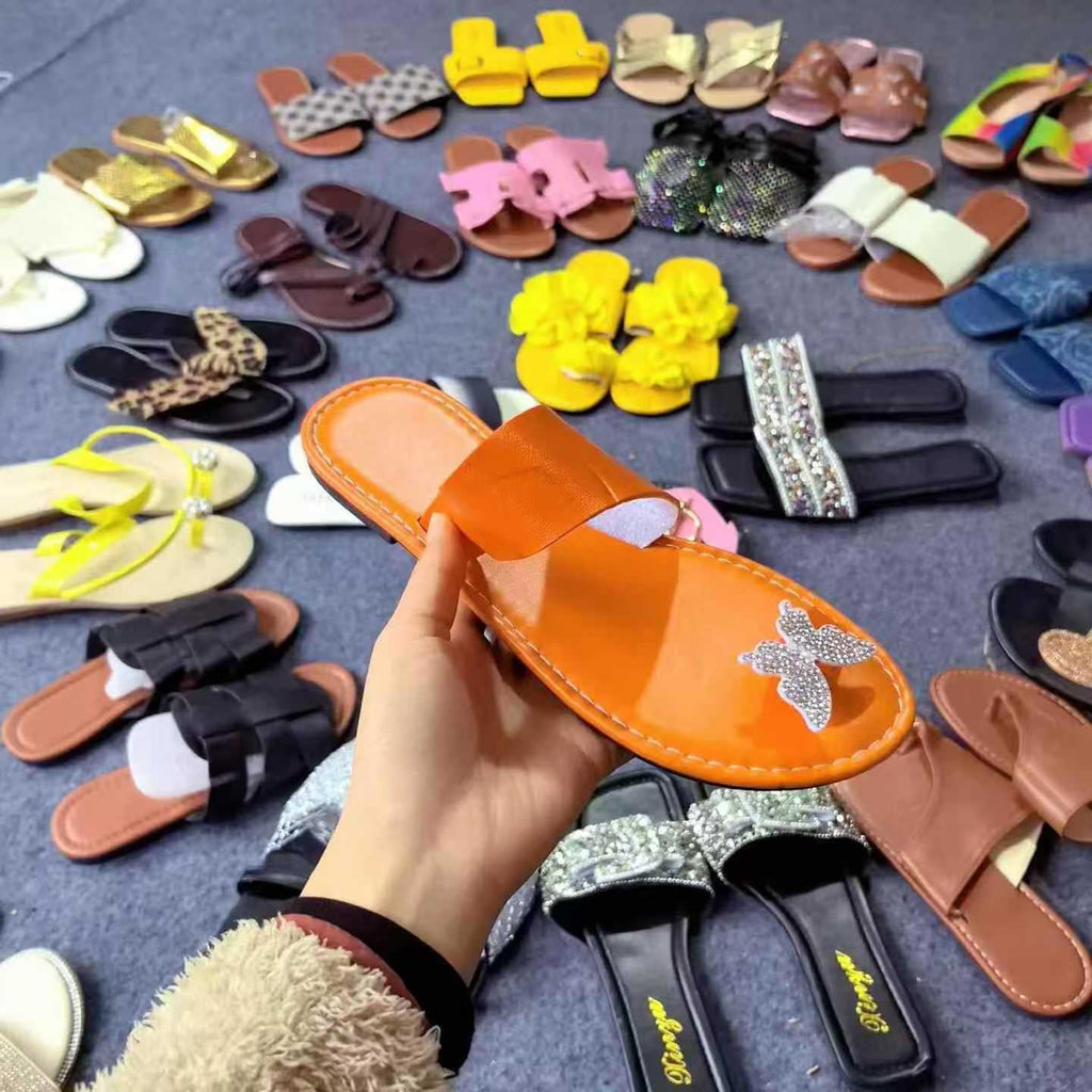 Women fashion flat slippers wholesale . MOQ 500
$2 pairs .,
