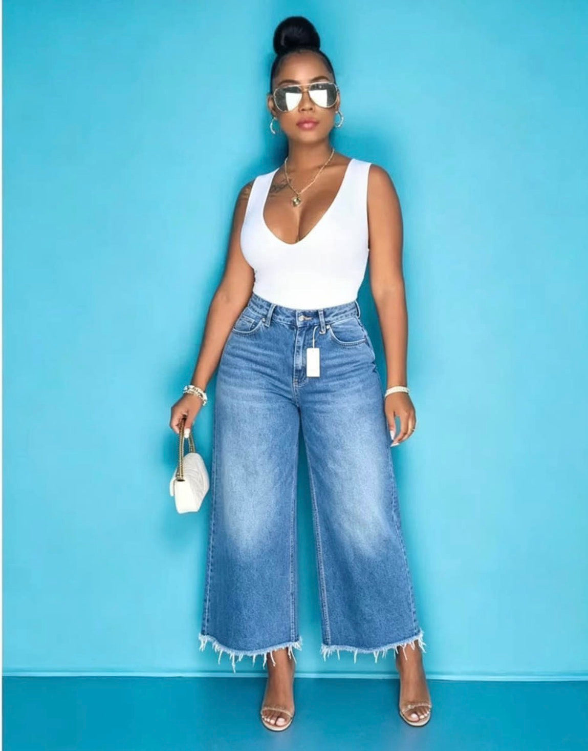 Women's stretch frayed wide leg crop jeans medium blue wash front view