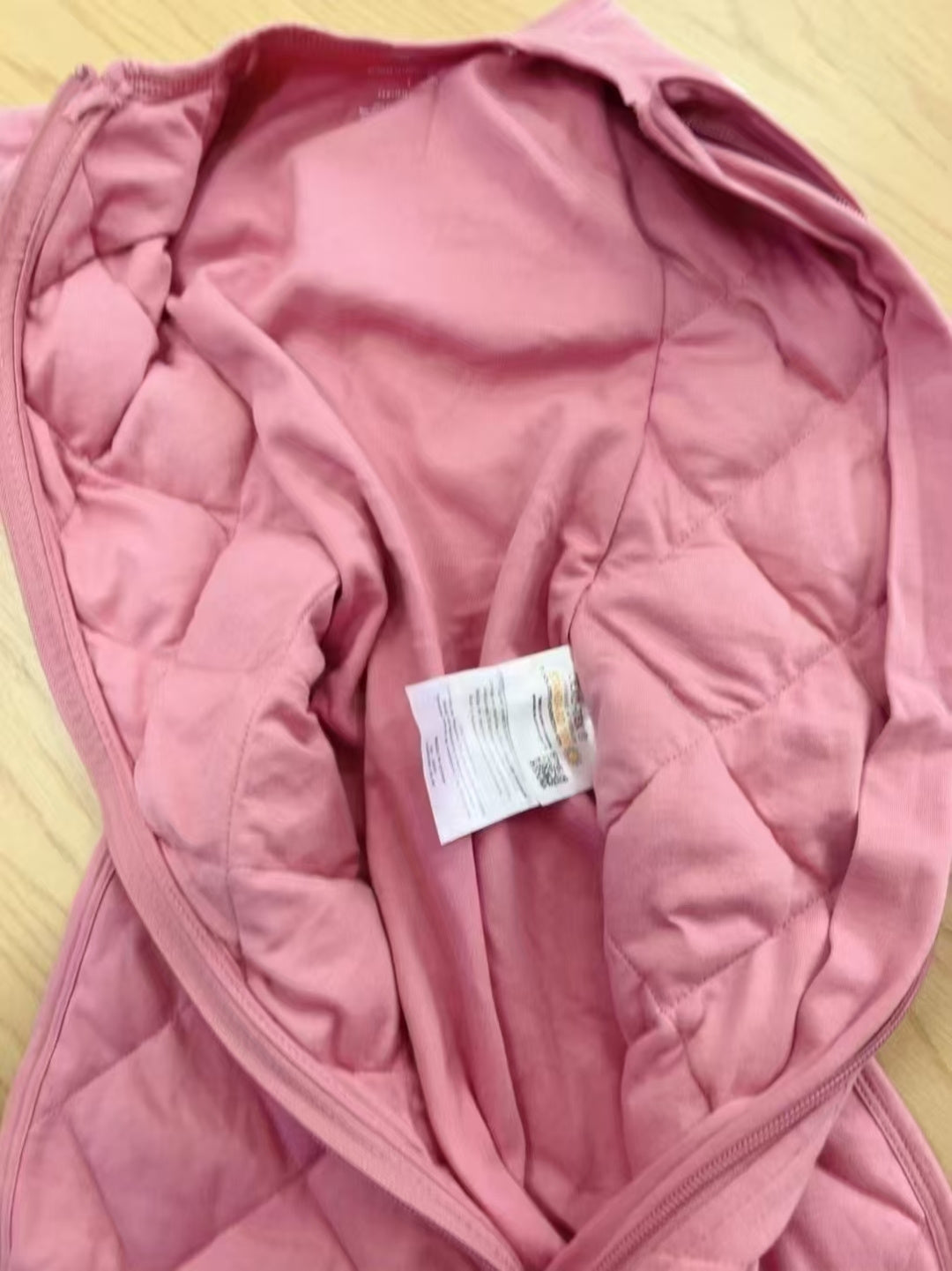 Dreamland baby sleep sack with granular filling. Made of organic cotton.