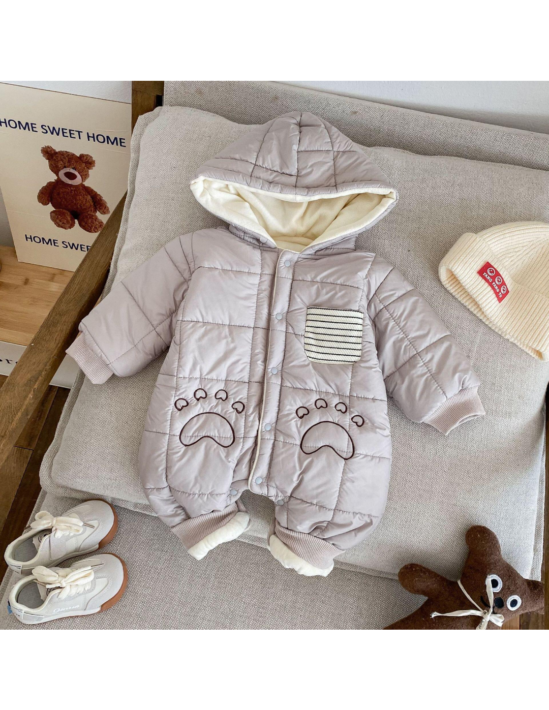 Baby Hooded Puffer Romper with Paw Print Detail – $8 Each | MOQ 12
