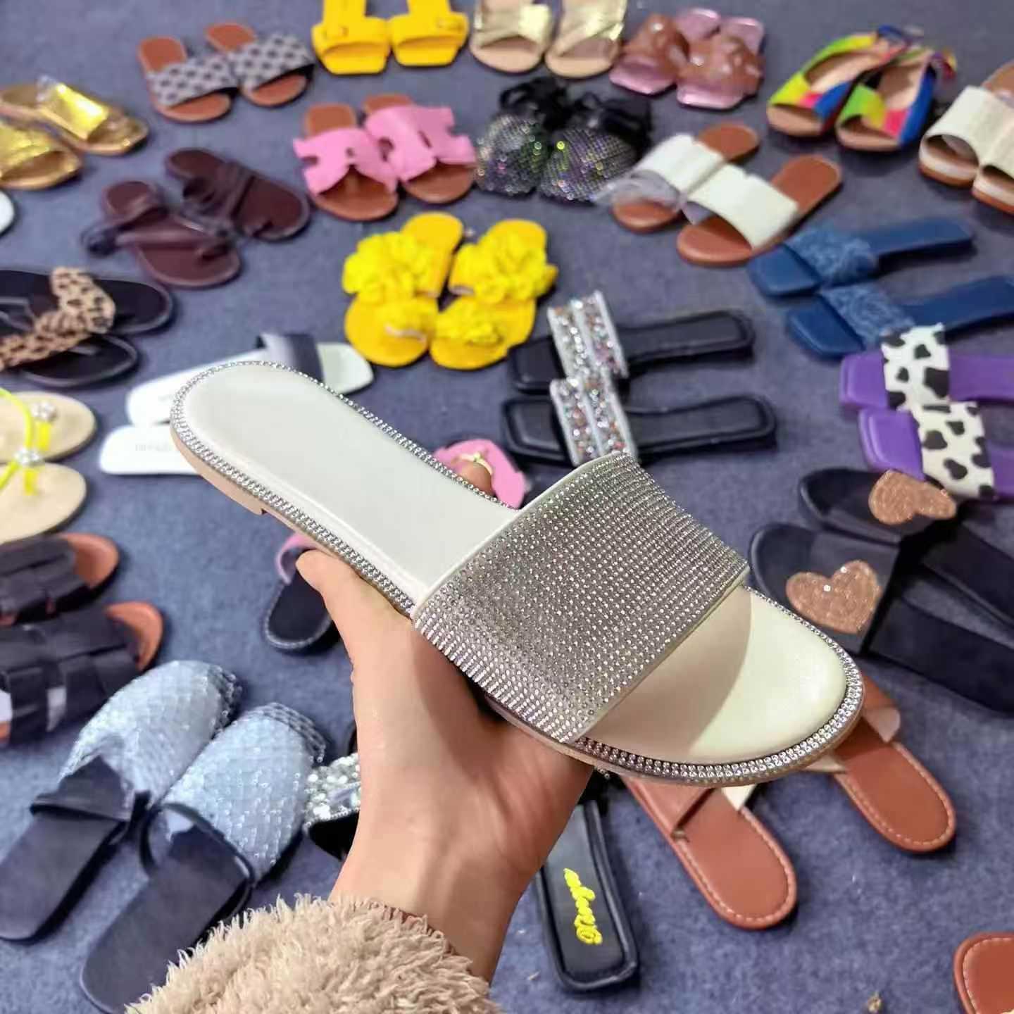 Women fashion flat slippers wholesale . MOQ 500
$2 pairs .,